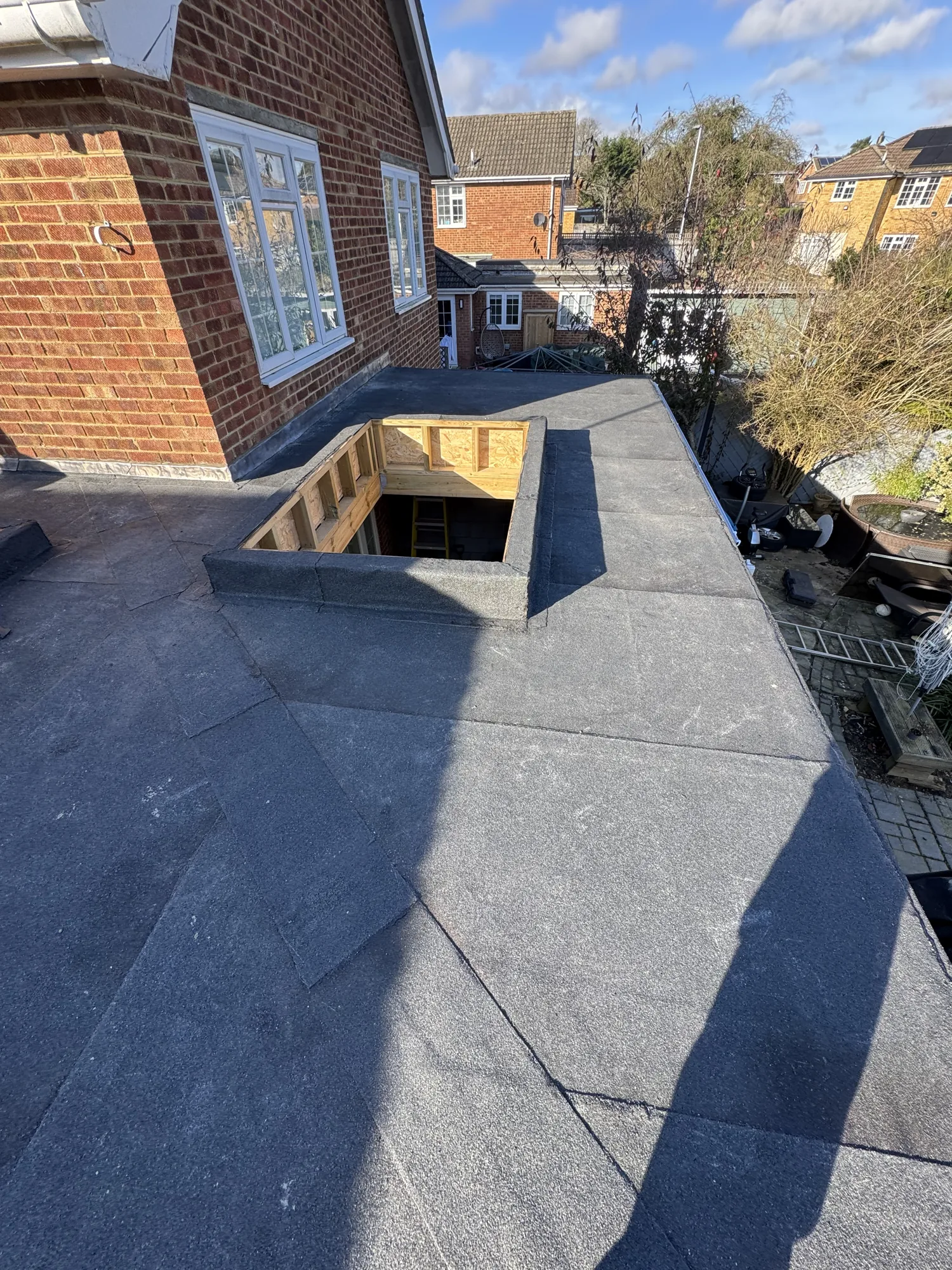 Flat roof rebuild with a new roof lantern opening